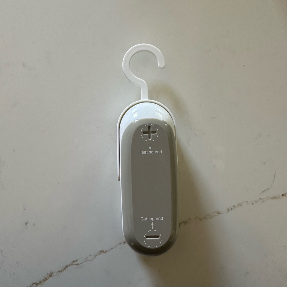 Gray and White Bag Sealer